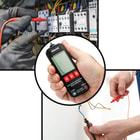 Full image of the Precision Digital Multimeter held in hand and shown being used.