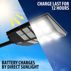 Full image showing batteries of the Outdoor Solar Powered Security Light 19,200 Lumens being charged by direct sunlight.