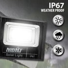 Full image of the Outdoor Solar Light 1100 Lumens out in the rain displaying that it is IP67 weather proof.