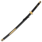 The 39” overall sword slides into a glossy black wooden scabbard with a shiny gold accent featuring a faux red jewel