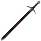 The black scabbard has red crosses down it, coordinating with the cross design on the guard and pommel. 