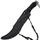 The 23 3/4” overall fantasy machete can be stored and carried in its sturdy nylon sheath with an adjustable shoulder strap