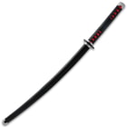The Demon Slayer Sword shown inside its matte black scabbard with black faux leather wrapping on the red faux ray skin handle.