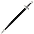 Short sword inside black scabbard with high polished accents. 
