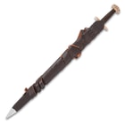 The Ballinderry Viking Sword shown in its dark brown sheath with carrying strap.