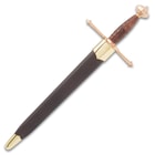 The Italian Dagger is shown secured in its brown leather sheath with gold-colored accents on the throat and tip.