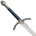 Zoomed view of metal hilt on silver stainless steel sword with blue wrapped genuine leather grip and faux blue jewel
