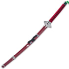 The 39” overall katana slides smoothly into a red wooden scabbard, which has metal accents and black cord-wrap