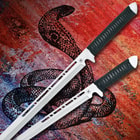 The twin ninja swords have nylon cord wrapped handles and the K Exclusive logo is at the top of each blade.  