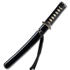 The 17” overall tanto sword fits like a glove in a black, lacquered wooden scabbard with black cord accents