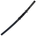 The 39” overall katana slides smoothly into a matte black scabbard with a carved gankyil design to match the tsuba