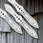 Three throwing knives laid side by side with “International Knife Throwing Hall of Fame” etched on the blades.