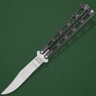 The dark skeletonized handle has a latch that secures the handles together.