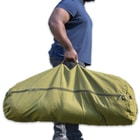The Large Side Zipper Duffle Bag is made of heavy-duty, olive drab 100 percent cotton canvas with a sturdy metal zipper