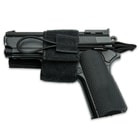 The polypropylene holster features an adjustable design and has an elastic bungee cord to secure the firearm