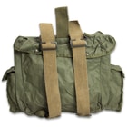 he rucksack also features nylon webbing straps with metal buckles on the top and bottom, perfect for securing a bedroll, blanket or other gear