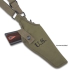 The pistol holster is made of durable, olive drab canvas with a brass, snap strap closure and features a stamped US