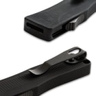 A close-up of the pocket clip and the slide trigger opener