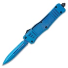 The Electric Blue Automatic OTF can be deployed with the slide trigger on the side