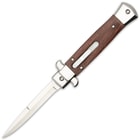 The 3 3/4" stainless steel blade is shown deployed from the wooden handle of the knife with slide trigger.