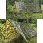 Two different views of the Camo Tarp in use in the wild