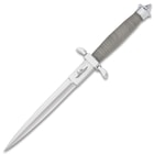 Hibben’s signature stamp can be found etched on the spear point blade, just beneath the oversized guard.