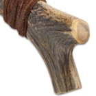 Detailed view of the genuine horn handle with an antler fork pommel.