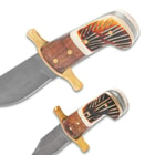 The handles are crafted of of walnut wood and engraved, torched bone