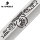 The knife has a keenly sharp, 6 3/4” stainless steel clip point blade with laser-etched Marines themed artwork