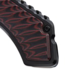 Detailed view of the red and black layered G10 inserts of the black aluminum handle.