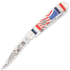 It has two razor-sharp stainless steel blades with Independence Day themed etchings, and it’s protected by a brass liner