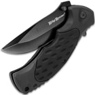 The stainless steel blade with black coating is shown partially opened from the black rubberized polymer handle.