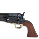 The handle of the black powder revolver is genuine walnut wood