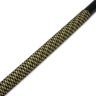 A view of the yellow and black paracord grip