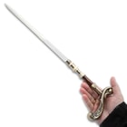 Angled image of the Sword Cane held in hand.
