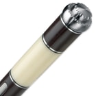 Synthetic ivory detailing is shown on the handle with stainless notched pommel.  