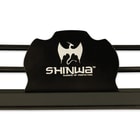“Shinwa Swords of Perfection” is painted on the front of the black wooden sword display. 