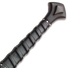 Zoomed view of the genuine leather wrapped wooden sword handle with silver pieces at the base and top of the grip
