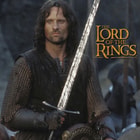 The Lord of the Rings character Aragorn holds the Sword of Strider.