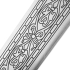 Closeup view of the intricate etchings on Excalibur’s blade. 