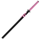 The black scabbard is wrapped with a bright pink hanging cord that matches the pink cord of the handle. 