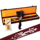  The tanto is shown with zoomed view of the dragon design on the scabbard and inside a decorative red box. 