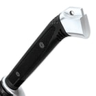 Detailed view of the black TPR handle and steel guard and pommel with lanyard hole. 