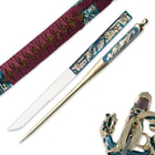 The detailing of the sheath is shown next to an ornate knife and letter opener with gold and blue accenting with another view of the dragon tsuba.