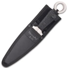 The handles are wrapped in black, waxed cotton cord for a comfortable, no-slip grip and each features an open-ring pommel