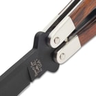 Zoomed view of the pins holding the black finished stainless steel blade to the cocobolo wood handles.