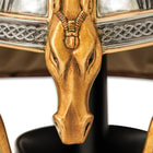 The side view of the helm with faux horse hair