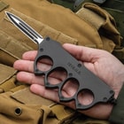 The 1918 OTF Trench Knuckle Knife shown in hand