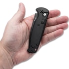 The automatic pocket knife is 4 2/5” when closed.