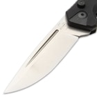 It has a 3 1/10” D2 tool steel blade with a stonewashed finish and a textured, G10 handle with a fluted thumb rest